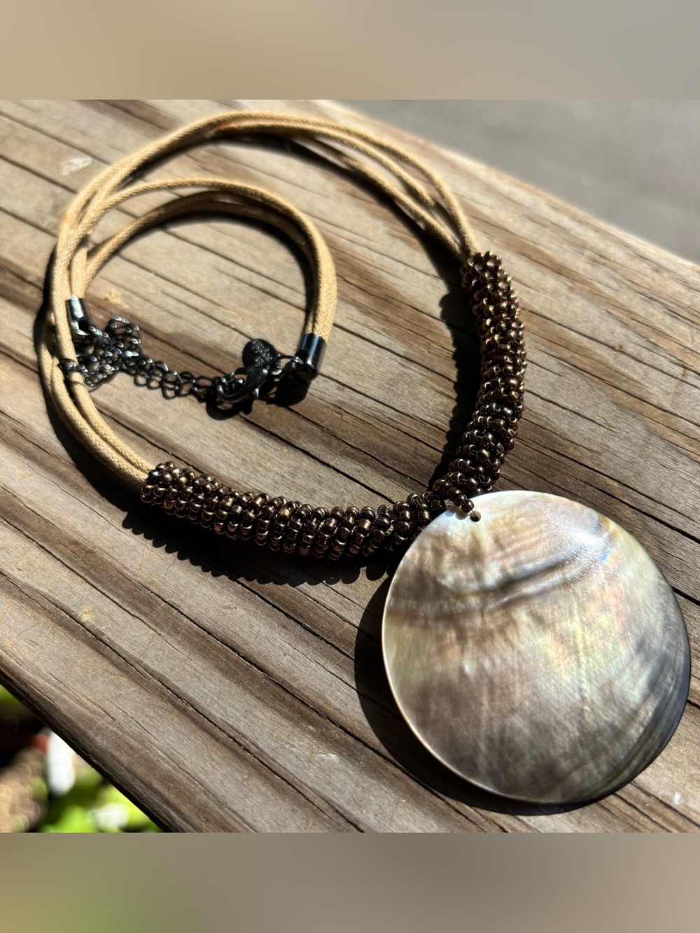 Lia Sophia Brown Beaded Cord Necklace with Iridescent Shell Disc